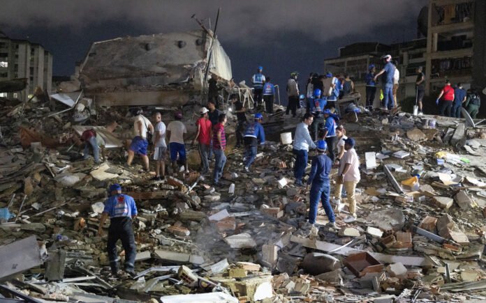 Woman pulled alive from Caracas rubble as death toll hits 589